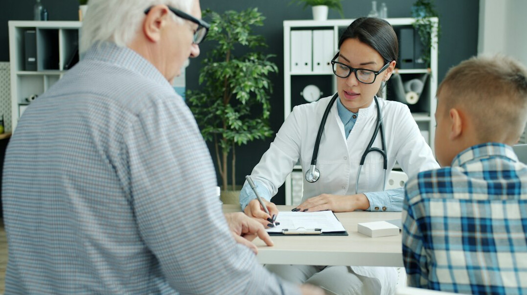 doctor explaining insurance plan to patient