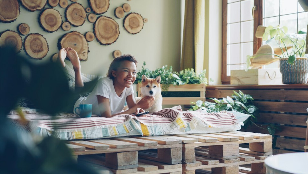 Woman reviewing her health insurance policy on a laptop at home