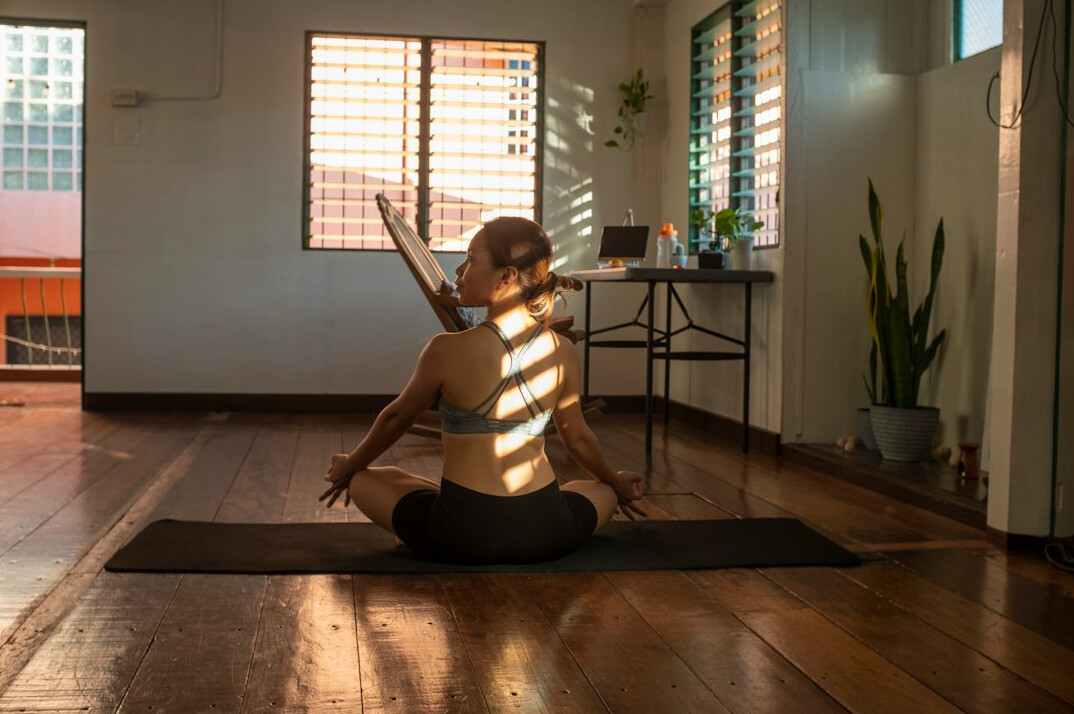 calm person meditating at home