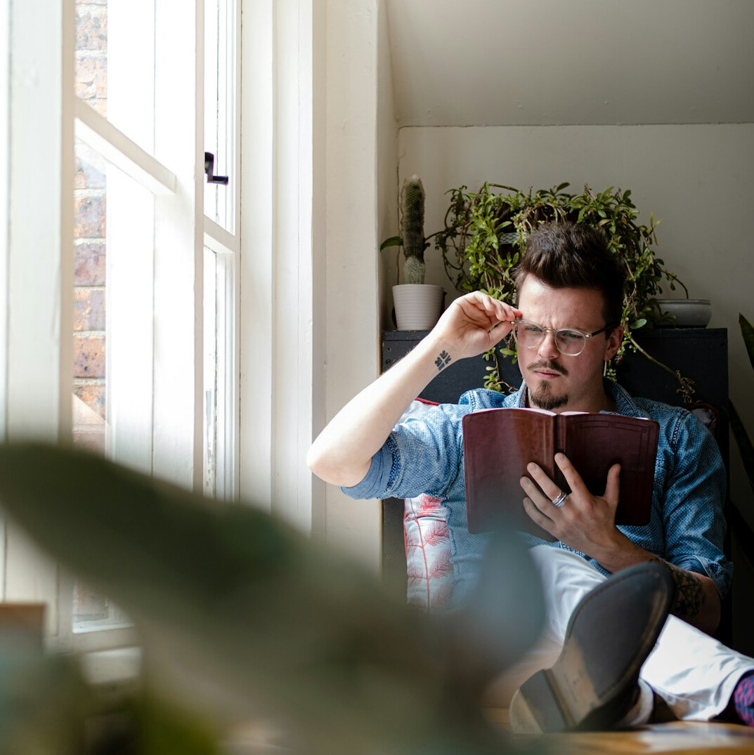 young adult reviewing insurance policy