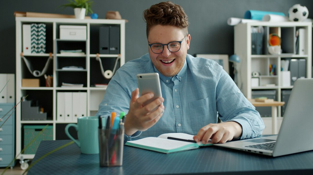 young professional checking health app on phone