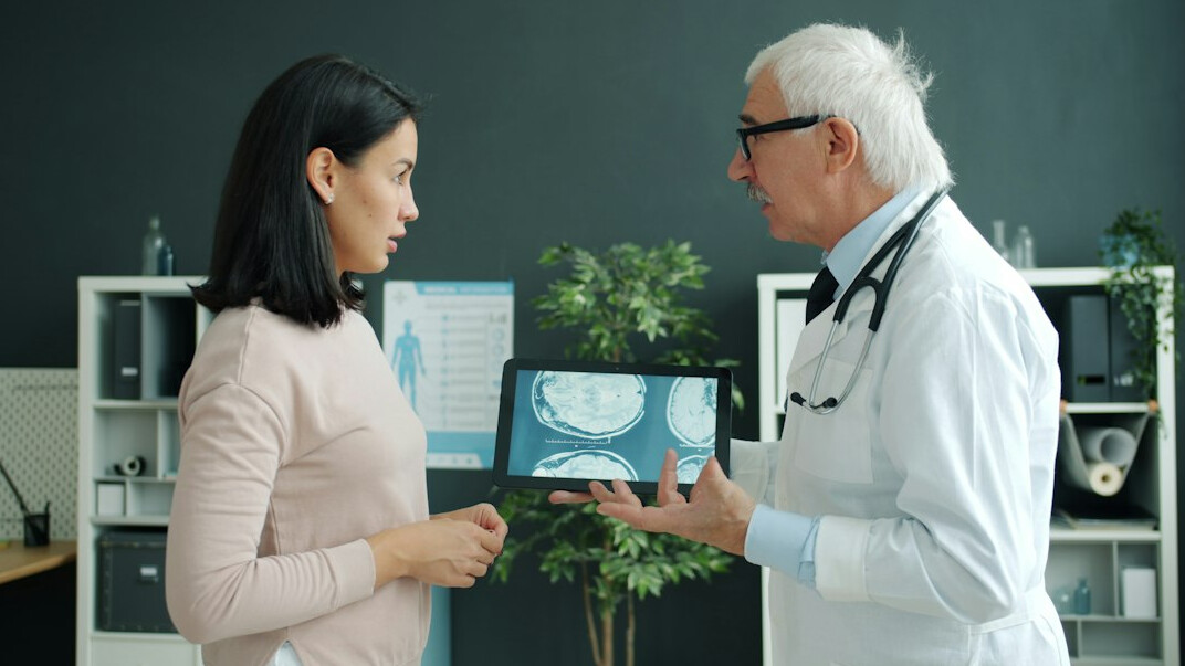 doctor and patient in exam room